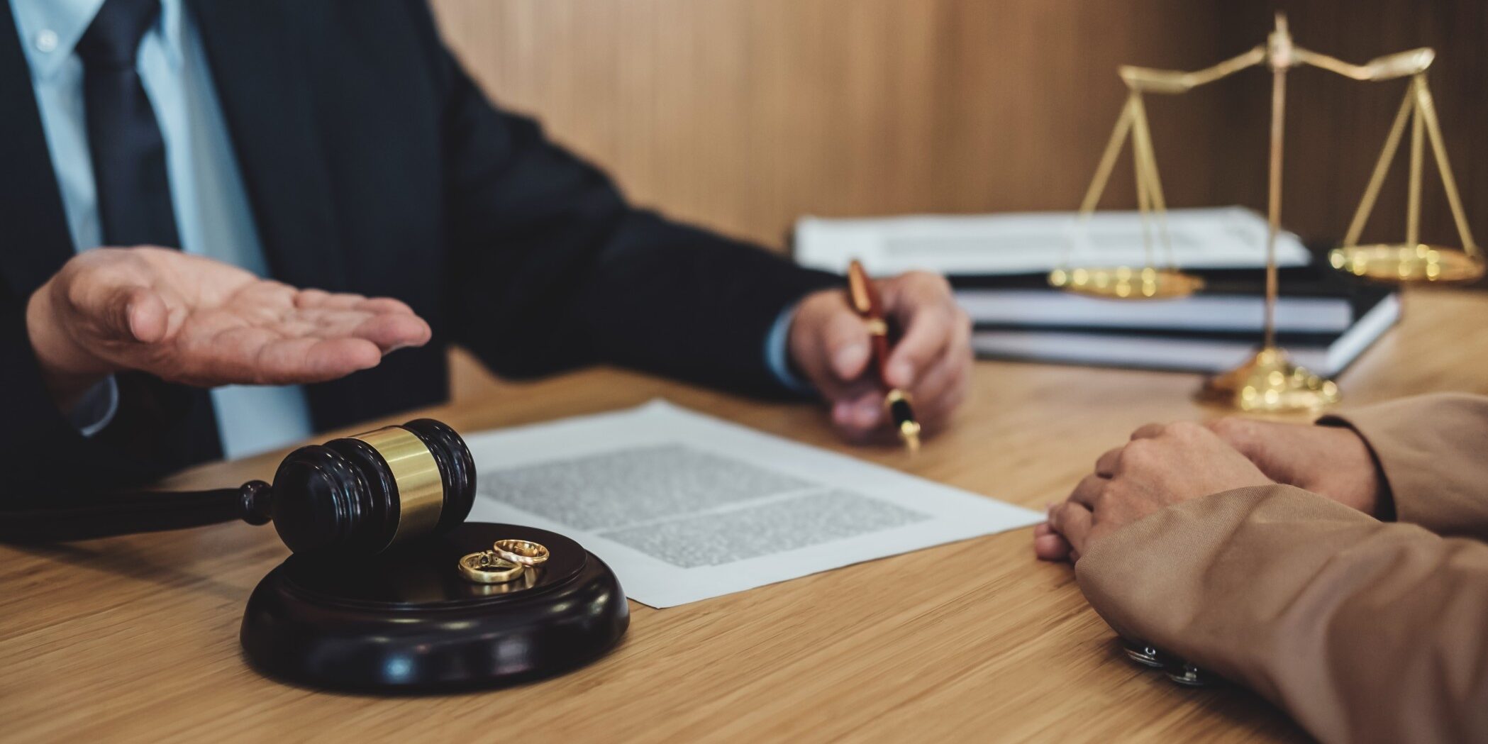 marriage-divorce-on-judge-gavel-deciding-consultation-between-a-businesswoman-and-male-lawyer-or_t20_B89apO