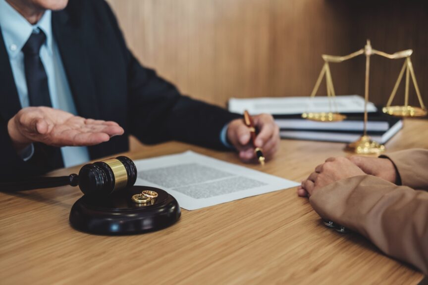 marriage-divorce-on-judge-gavel-deciding-consultation-between-a-businesswoman-and-male-lawyer-or_t20_B89apO