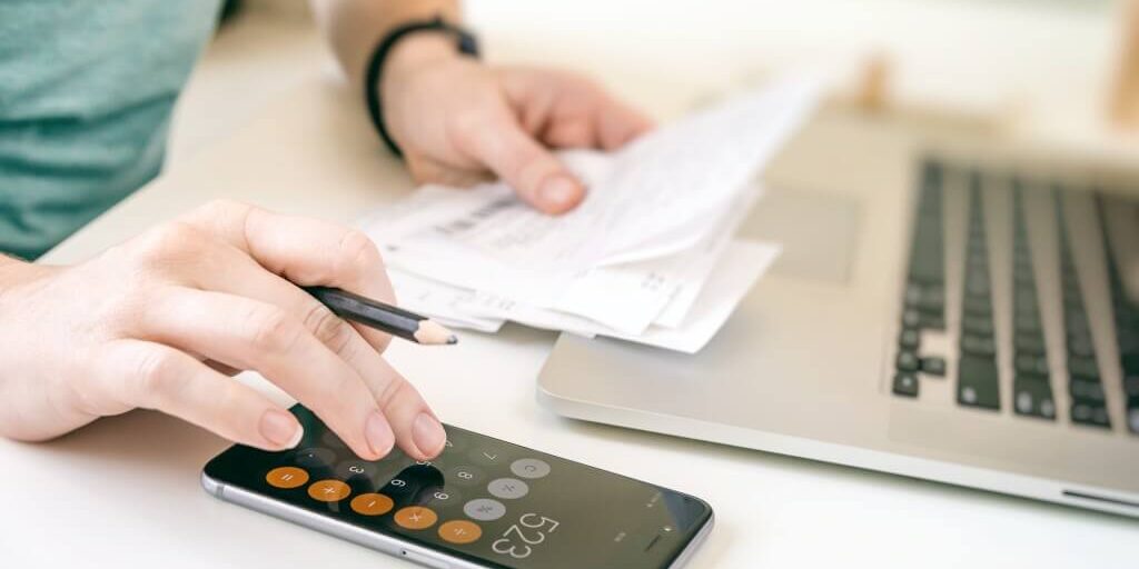 woman-making-audit-of-household-spendings-at-home-account-accountant-analysis-analyzing-annual-audit_t20_A9EwE6 (1)
