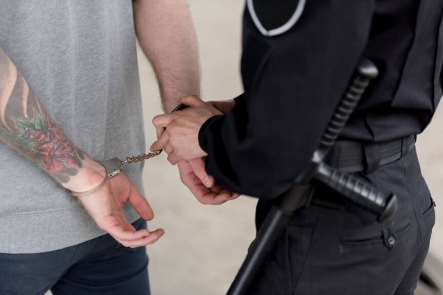cropped-shot-of-policewoman-with-truncheon-handcuf-2022-12-16-16-36-41 (1)